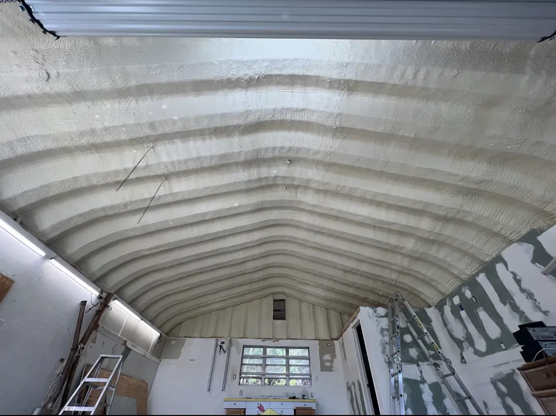 Spray polyurethane foam applied to the underside of a metal roof deck in Wilmette